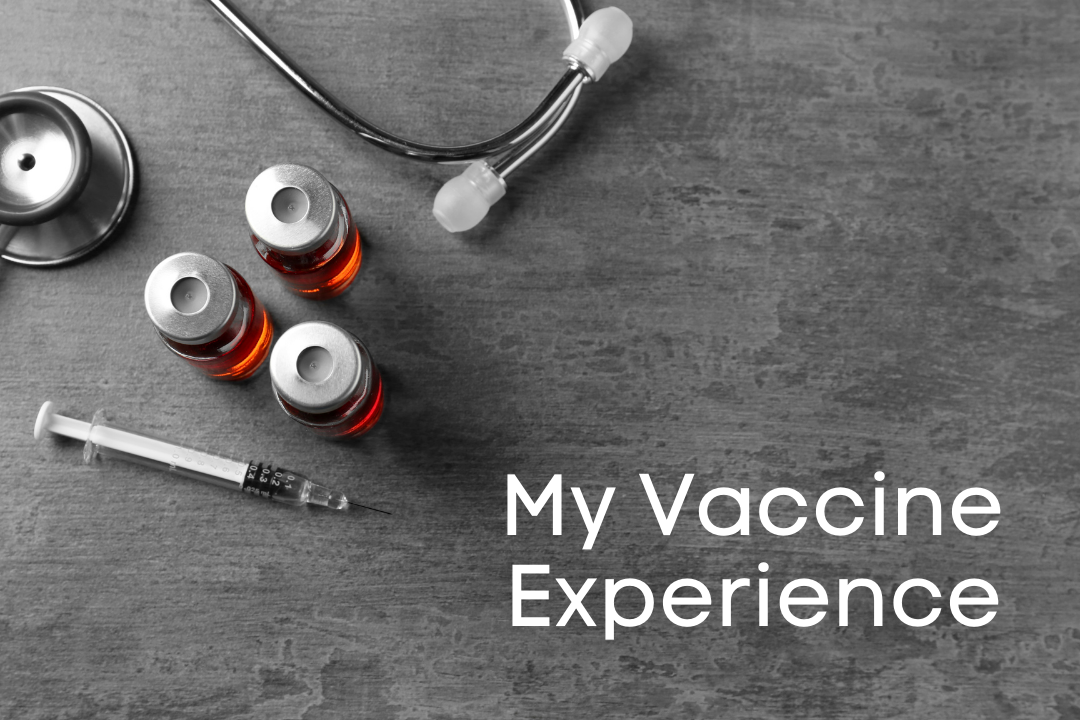 3 viles, a stethoscope and a syringe on a grey table with the words My Vaccine Experience in the lower right corner