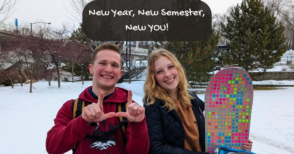 Photo of two students holding a snowboard with a text overlay that reads "New Year, New Semester, New YOU!"